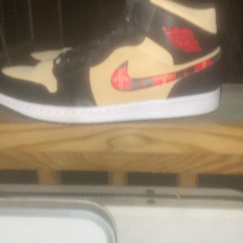 Jordan 1sBlack and Cream High-Top Sneakers with Red Accents